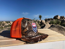 Load image into Gallery viewer, Orange/Camo Realtree Trucker Hat